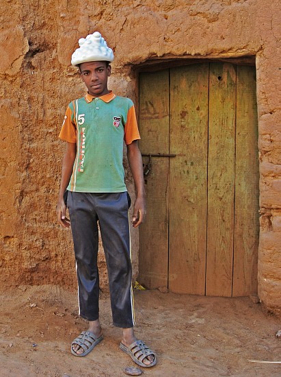 Venske &amp; Spänle, C-print of Chapeau Malienne II on Boy, 2017
C-print on vinyl, 55 x 73 inches (139 x 186 cm), Edition of 5